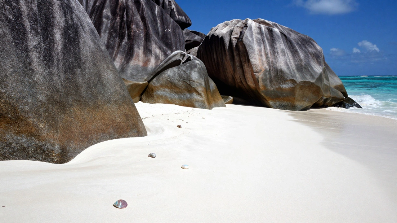 Granite boulders on a fine white sand beach in the Seychelles