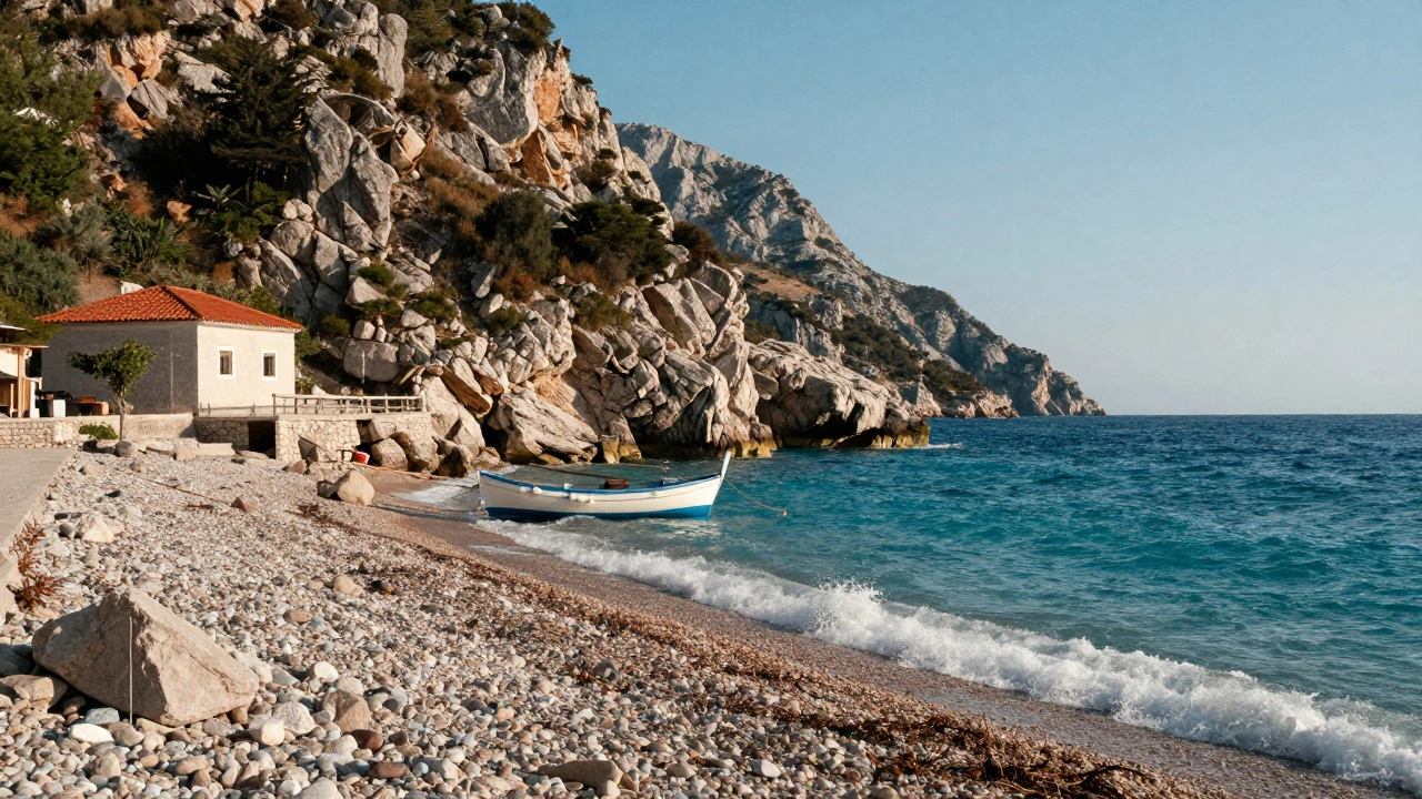 Turquoise waters and cliffs of the Albanian Riviera with a fishing boat